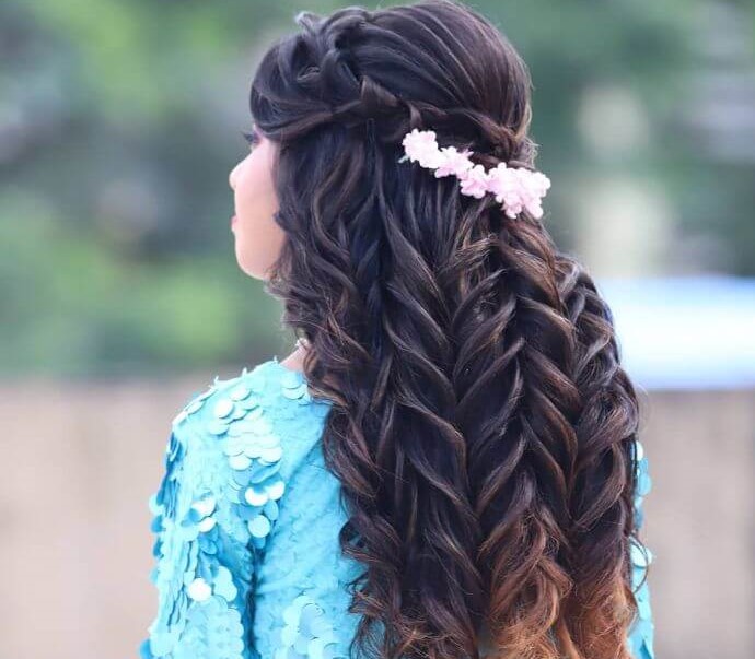 Multiple braided hair of Indian girl